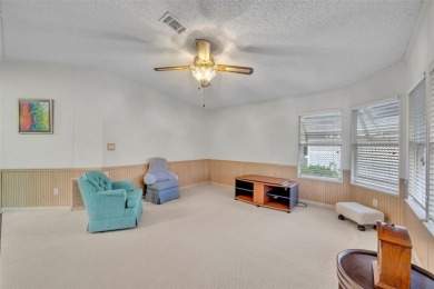 55+ Community!!! Move in Ready with lots of storage. Located in on Sweetwater Golf and Tennis Club in Florida - for sale on GolfHomes.com, golf home, golf lot