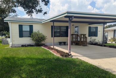 Located in the desirable Fox Run 55+ community, this on Bay Tree Golf Course in Florida - for sale on GolfHomes.com, golf home, golf lot