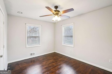 Charming brick ranch on a basement, perfectly positioned in a on Browns Mill Golf Course in Georgia - for sale on GolfHomes.com, golf home, golf lot