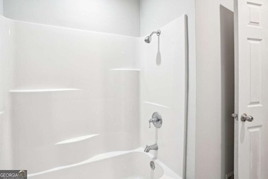 Charming brick ranch on a basement, perfectly positioned in a on Browns Mill Golf Course in Georgia - for sale on GolfHomes.com, golf home, golf lot