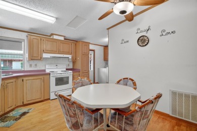 Located in the desirable Fox Run 55+ community, this on Bay Tree Golf Course in Florida - for sale on GolfHomes.com, golf home, golf lot