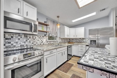 55+ Community!!! Move in Ready with lots of storage. Located in on Sweetwater Golf and Tennis Club in Florida - for sale on GolfHomes.com, golf home, golf lot