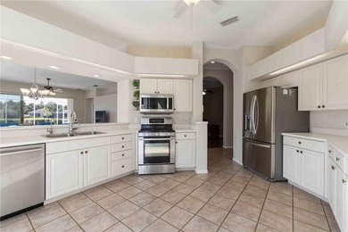 Welcome home. Relax and unwind in your private pool and spa on Rosedale Golf and Tennis Club in Florida - for sale on GolfHomes.com, golf home, golf lot