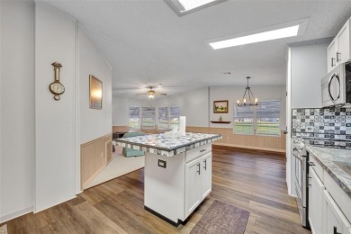 55+ Community!!! Move in Ready with lots of storage. Located in on Sweetwater Golf and Tennis Club in Florida - for sale on GolfHomes.com, golf home, golf lot