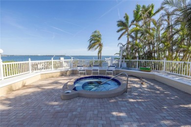 Welcome to your dream retreat in the sought-after Palma Del Mar on Isla Del Sol Yacht and Country Club in Florida - for sale on GolfHomes.com, golf home, golf lot