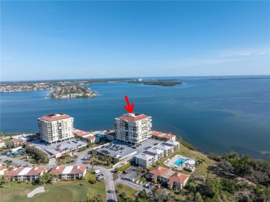 Welcome to your dream retreat in the sought-after Palma Del Mar on Isla Del Sol Yacht and Country Club in Florida - for sale on GolfHomes.com, golf home, golf lot