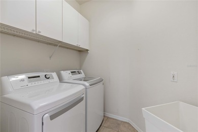 Welcome home. Relax and unwind in your private pool and spa on Rosedale Golf and Tennis Club in Florida - for sale on GolfHomes.com, golf home, golf lot