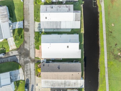 55+ Community!!! Move in Ready with lots of storage. Located in on Sweetwater Golf and Tennis Club in Florida - for sale on GolfHomes.com, golf home, golf lot