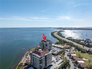 Welcome to your dream retreat in the sought-after Palma Del Mar on Isla Del Sol Yacht and Country Club in Florida - for sale on GolfHomes.com, golf home, golf lot