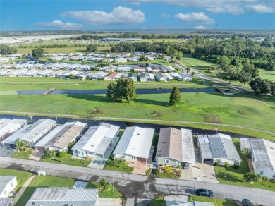 55+ Community!!! Move in Ready with lots of storage. Located in on Sweetwater Golf and Tennis Club in Florida - for sale on GolfHomes.com, golf home, golf lot