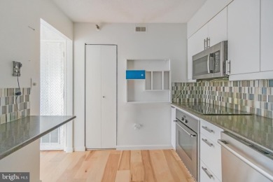 Discover an incredible opportunity to own a large, light-filled on Leisure World Golf Club in Maryland - for sale on GolfHomes.com, golf home, golf lot