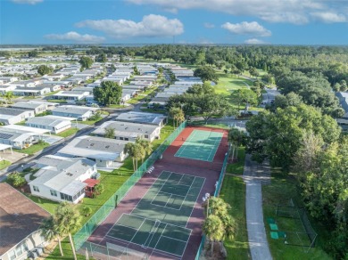 55+ Community!!! Move in Ready with lots of storage. Located in on Sweetwater Golf and Tennis Club in Florida - for sale on GolfHomes.com, golf home, golf lot