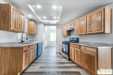This updated 1972 Silvercrest 2-bed,2-bath 1440 sq ft home plus on Date Palm Country Club in California - for sale on GolfHomes.com, golf home, golf lot