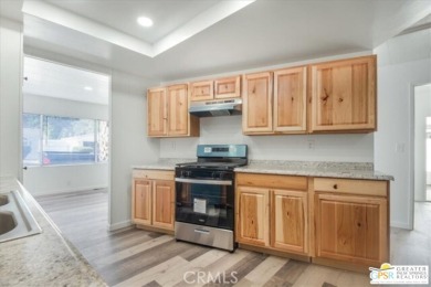 This updated 1972 Silvercrest 2-bed,2-bath 1440 sq ft home plus on Date Palm Country Club in California - for sale on GolfHomes.com, golf home, golf lot