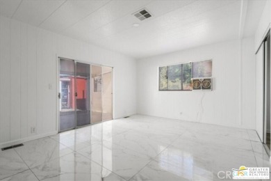 This updated 1972 Silvercrest 2-bed,2-bath 1440 sq ft home plus on Date Palm Country Club in California - for sale on GolfHomes.com, golf home, golf lot