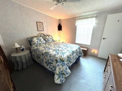 This beautifully maintained 2-bedroom, 2-bathroom home is being on Crystal Lake Club in Florida - for sale on GolfHomes.com, golf home, golf lot