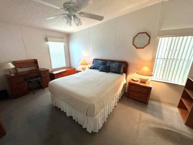 This beautifully maintained 2-bedroom, 2-bathroom home is being on Crystal Lake Club in Florida - for sale on GolfHomes.com, golf home, golf lot