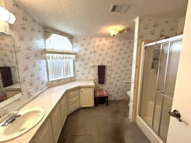 This beautifully maintained 2-bedroom, 2-bathroom home is being on Crystal Lake Club in Florida - for sale on GolfHomes.com, golf home, golf lot