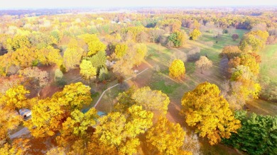 Welcome to your slice of paradise in the heart of Edwardsburg on Garver Lake Golf Course in Michigan - for sale on GolfHomes.com, golf home, golf lot