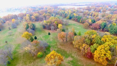 Welcome to your slice of paradise in the heart of Edwardsburg on Garver Lake Golf Course in Michigan - for sale on GolfHomes.com, golf home, golf lot