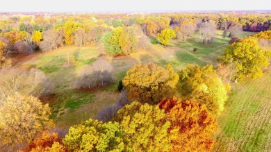 Welcome to your slice of paradise in the heart of Edwardsburg on Garver Lake Golf Course in Michigan - for sale on GolfHomes.com, golf home, golf lot