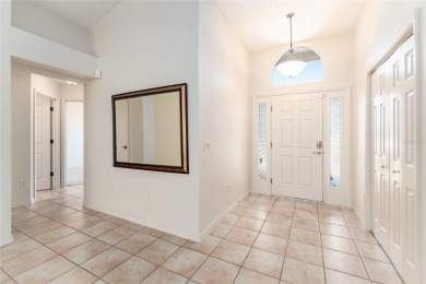 Take a close look at this VALUE-PRICED, OLEANDER Designer in the on The Links of Spruce Creek in Florida - for sale on GolfHomes.com, golf home, golf lot