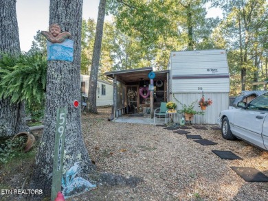 This charming property offers a newer washer and dryer, a on Lake Tansi Village Country Club in Tennessee - for sale on GolfHomes.com, golf home, golf lot