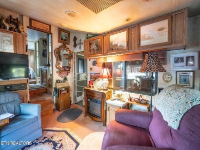 This charming property offers a newer washer and dryer, a on Lake Tansi Village Country Club in Tennessee - for sale on GolfHomes.com, golf home, golf lot