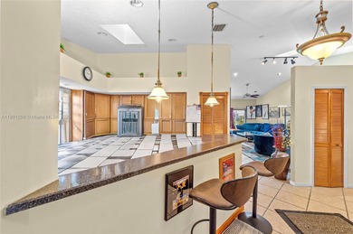 This beautiful 2-bedroom, 2-bath townhome features vaulted on Woodmont Country Club in Florida - for sale on GolfHomes.com, golf home, golf lot
