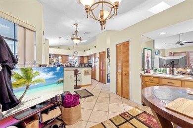 This beautiful 2-bedroom, 2-bath townhome features vaulted on Woodmont Country Club in Florida - for sale on GolfHomes.com, golf home, golf lot