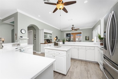 You will know you found paradise when you drive by the row of on Burnt Store Golf Club in Florida - for sale on GolfHomes.com, golf home, golf lot