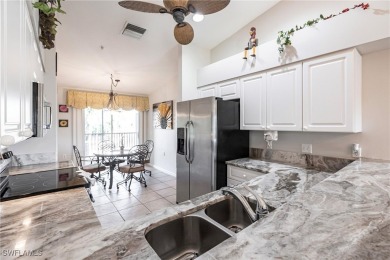 Welcome to your dream second-floor condo with breathtaking views on Heritage Palms Golf and Country Club in Florida - for sale on GolfHomes.com, golf home, golf lot