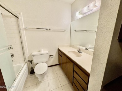 Discover a peaceful single-level home steps away from the golf on Aspen Valley Golf Club in Arizona - for sale on GolfHomes.com, golf home, golf lot
