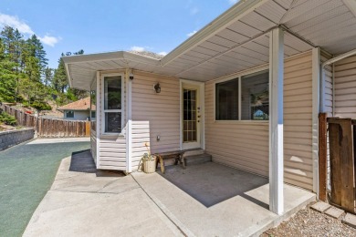 This 4-bed, 3-bath family home is in North Glenmore's heart on  in  - for sale on GolfHomes.com, golf home, golf lot