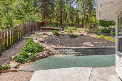 This 4-bed, 3-bath family home is in North Glenmore's heart on  in  - for sale on GolfHomes.com, golf home, golf lot