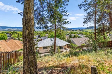 This 4-bed, 3-bath family home is in North Glenmore's heart on  in  - for sale on GolfHomes.com, golf home, golf lot
