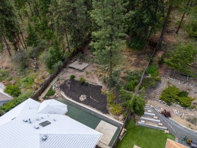 This 4-bed, 3-bath family home is in North Glenmore's heart on  in  - for sale on GolfHomes.com, golf home, golf lot