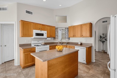 Located within the gated, highly sought-after Community of Quail on Quail Creek Country Club  in Arizona - for sale on GolfHomes.com, golf home, golf lot