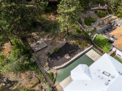 This 4-bed, 3-bath family home is in North Glenmore's heart on  in  - for sale on GolfHomes.com, golf home, golf lot