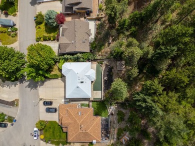 This 4-bed, 3-bath family home is in North Glenmore's heart on  in  - for sale on GolfHomes.com, golf home, golf lot