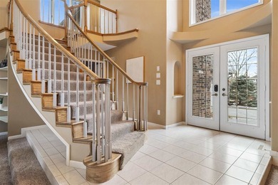 Situated on over a half-acre double lot among mature trees and on Brown Deer Golf Club in Iowa - for sale on GolfHomes.com, golf home, golf lot