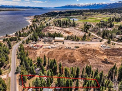 Level building lot bordering Tamarack land with direct access to on Osprey Meadows at Tamarack Resort in Idaho - for sale on GolfHomes.com, golf home, golf lot