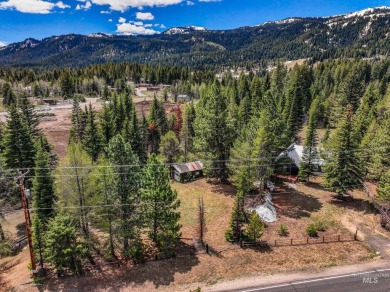 Level building lot bordering Tamarack land with direct access to on Osprey Meadows at Tamarack Resort in Idaho - for sale on GolfHomes.com, golf home, golf lot