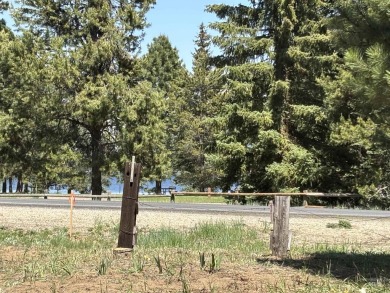 Level building lot bordering Tamarack land with direct access to on Osprey Meadows at Tamarack Resort in Idaho - for sale on GolfHomes.com, golf home, golf lot