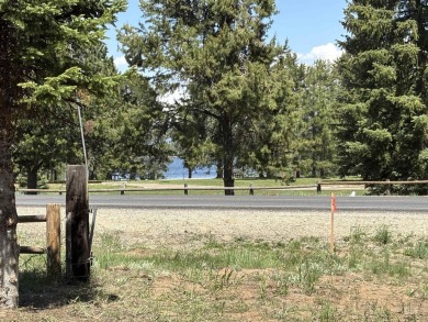 Level building lot bordering Tamarack land with direct access to on Osprey Meadows at Tamarack Resort in Idaho - for sale on GolfHomes.com, golf home, golf lot