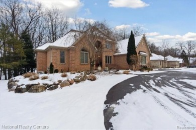 Location, location, location! This five-bedroom, four-full-bath on Prestwick Village Golf Club in Michigan - for sale on GolfHomes.com, golf home, golf lot