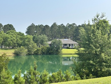 Level building lot with Boat Slip #2 (Tax Map #162-10-00-178-00) on Players Course At Wyboo Plantation in South Carolina - for sale on GolfHomes.com, golf home, golf lot