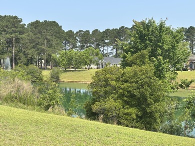 Level building lot with Boat Slip #2 (Tax Map #162-10-00-178-00) on Players Course At Wyboo Plantation in South Carolina - for sale on GolfHomes.com, golf home, golf lot