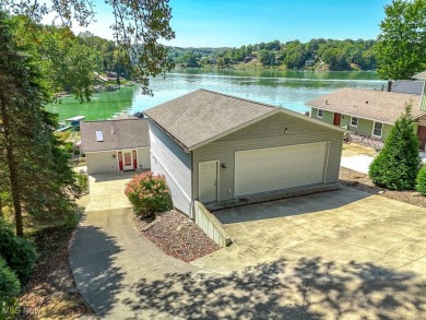 Lakefront Luxury Awaits! Wake up to stunning lake views in this on Lake Mohawk Golf Club in Ohio - for sale on GolfHomes.com, golf home, golf lot