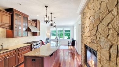 This exquisite two-bedroom townhouse is nestled within a on The Country Club At New Seabury in Massachusetts - for sale on GolfHomes.com, golf home, golf lot